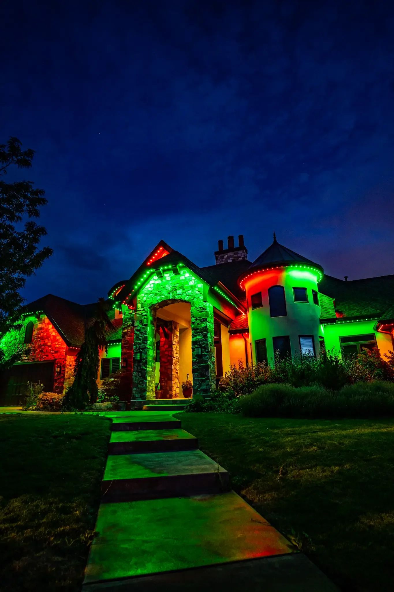 Home with red and green permanent Christmas lights
