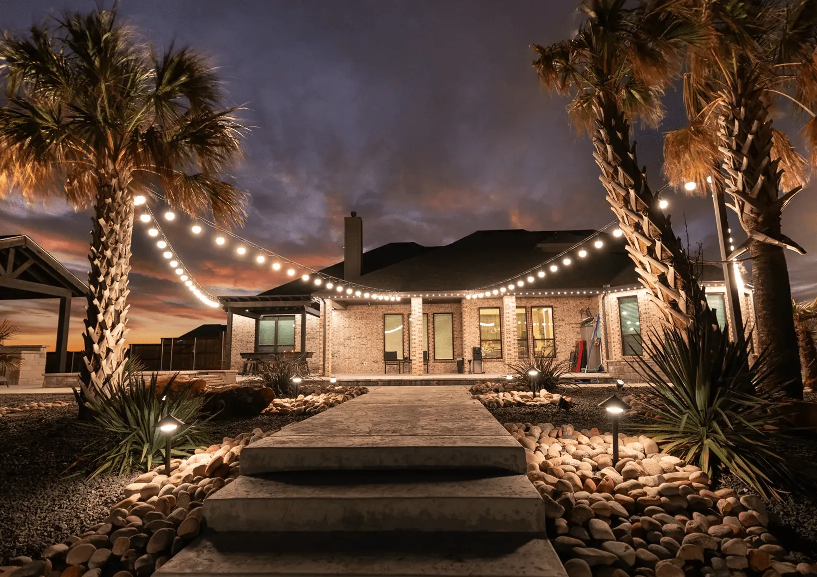 Home with Happy's lights at night
