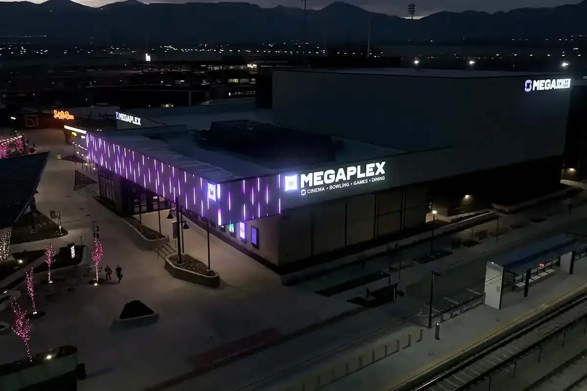 Megaplex theater building outlined with Happy's Saber Series lighting